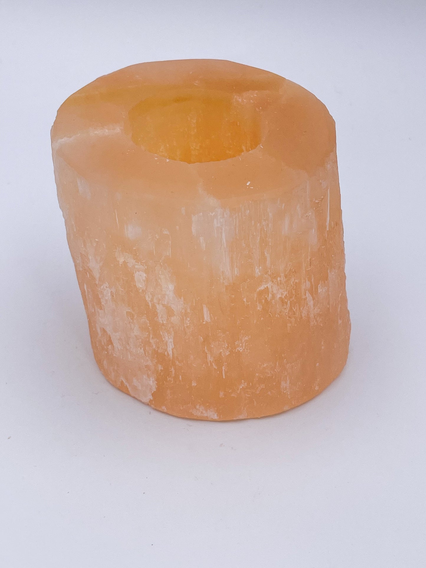 Orange selenite candle holder