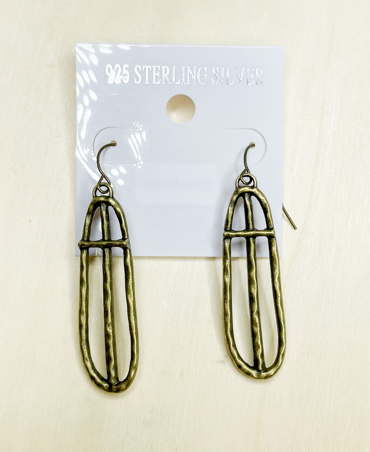HOLLOWED OUT CROSS EARRING